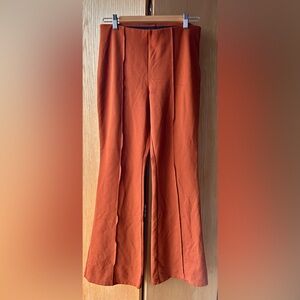 A New Day pumpkin colored pull on pants size M. Smoke and pet free home.